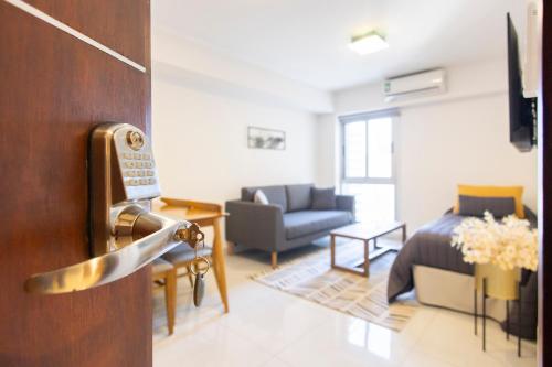 a room with a door open to a living room at HOMEFULL Apartamentos in Salta