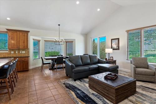 a living room with a couch and a table at Piney Ridge TR6 Hot Tub Pool in Eden