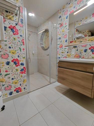 a bathroom with a shower and a walk in shower at Numi Hotel in Istanbul