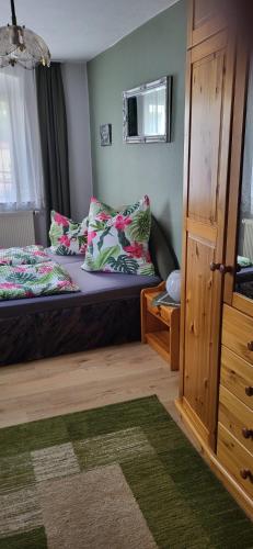 En eller flere senge i et værelse på Gästewohnung Gerda