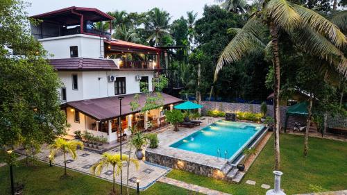 an aerial view of a house with a swimming pool at Breezy River in Kalutara