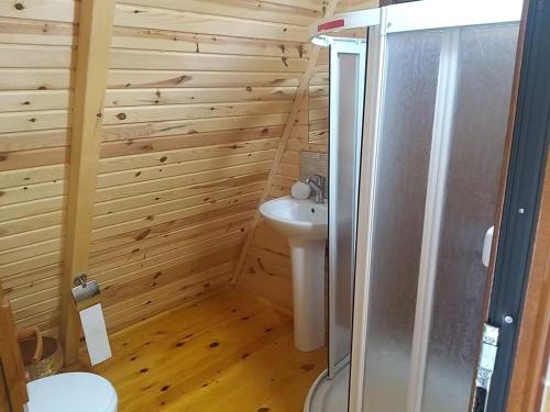 a bathroom with a toilet and a sink at Elagza Dag Evi in Rize