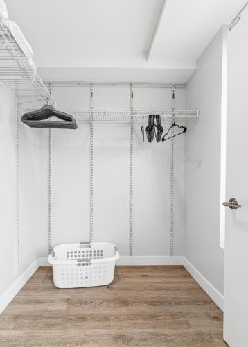 a bathroom with a bath tub in a room at High-end Modern 3BR 3BA Condo Assembly Square in Somerville