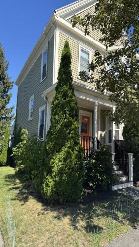 a house with a christmas tree in front of it at Maggie S Place in Salem