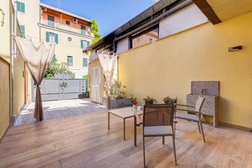 Appartamento pigneto con giardino privato e parcheggio