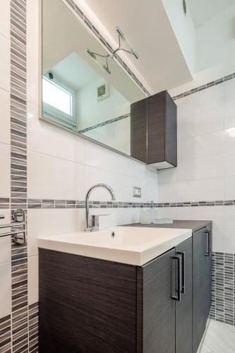 a bathroom with a sink and a mirror at Sea 150mt - Il Vicolo di Cetara in Cetara