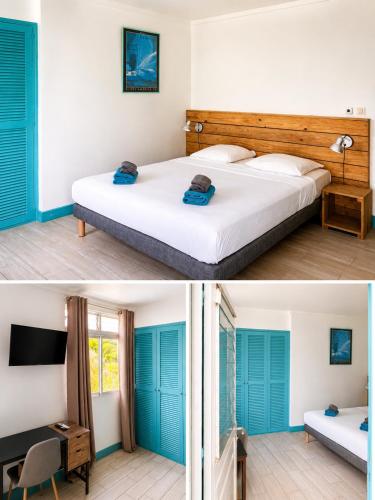 a bedroom with blue shutters and a bed at Hotel-Restaurant La Dunette in Sainte-Anne