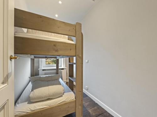 a couple of bunk beds in a room at Luxury Country House with Pool in Manhay