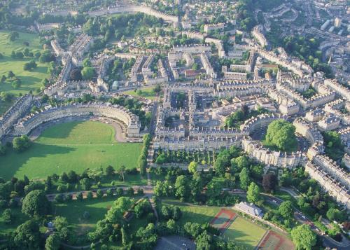 an aerial view of a city with trees and buildings at Lady Margaret's in Bath