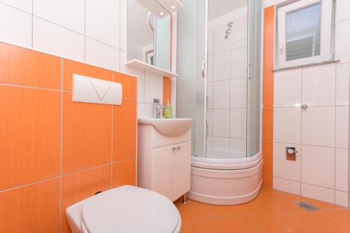 Kúpeľňa v ubytovaní Apartments Jaman Ivan