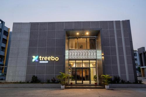 a freeko building with a freeko sign on it at Treebo Imperia, Kommadi in Visakhapatnam