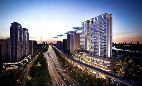 a city with buildings and traffic on a highway at Lumière Royal Sky Residence in Ho Chi Minh City