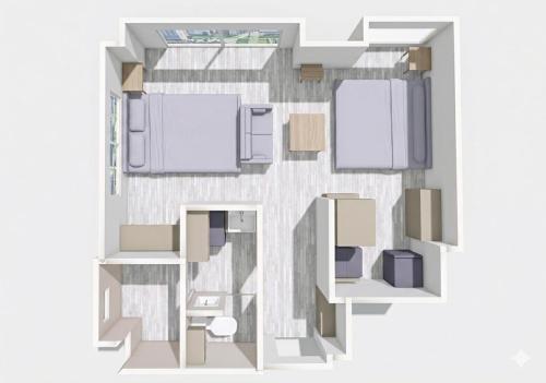a floor plan of a room with furniture at Residence Hotel Kamoike in Kagoshima