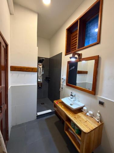 Ванная комната в Oasis Nungwi