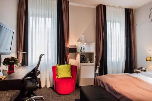 Postel nebo postele na pokoji v ubytování Best Western Premier Hotel Rebstock