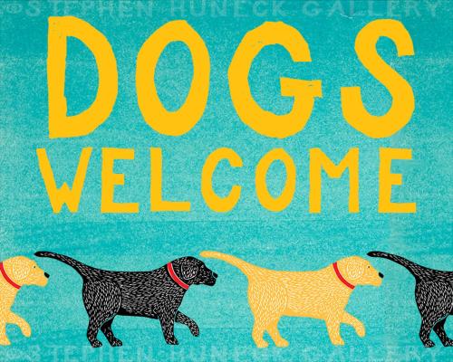 a book with three dogs welcome written in yellow and black at Luxe Vista in Serra