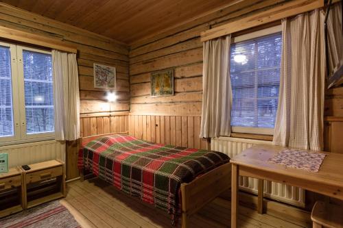 Postel nebo postele na pokoji v ubytování Tapion Tupa