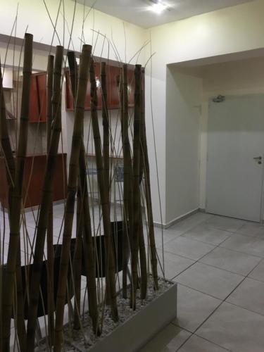 a room with a sculpture of trees in it at Hotel El Porteño in Buenos Aires