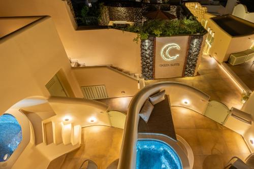 an overhead view of a spiral staircase in a building at Casita Suites in Megalochori