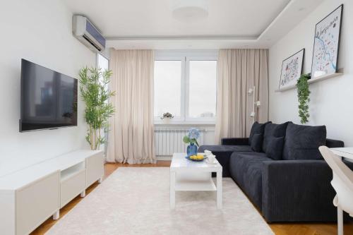 Modern Apartment with Air Conditioning in Downtown by Noclegi Renters
