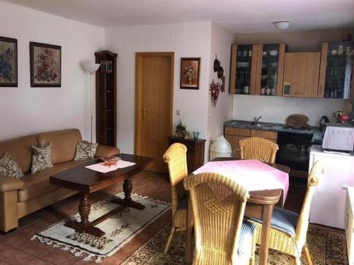 a living room with a couch and a table at Apartment in Lennestadt for 2 Person in Lennestadt