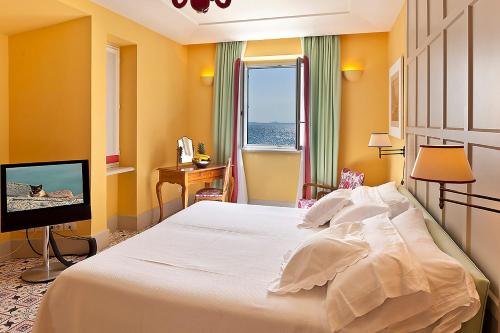 Postel nebo postele na pokoji v ubytování Regina Isabella-Resort Spa Restaurant