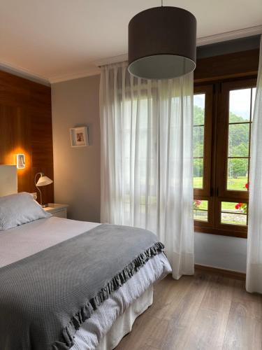 Krevet ili kreveti u jedinici u objektu Hotel Rural El Torrejon