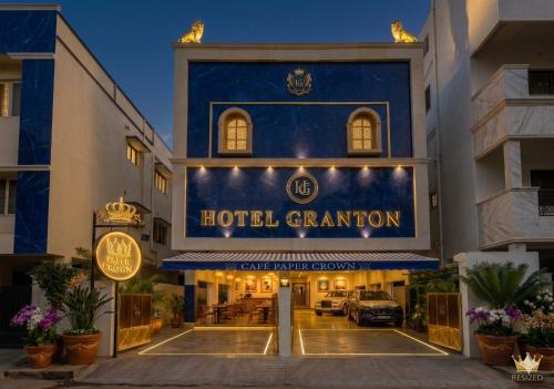 a hotel with a sign that reads hotel generation at Hotel Granton By Carlton Suites in Hyderabad