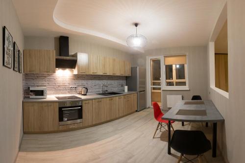 Η κουζίνα ή μικρή κουζίνα στο Kyiv Yuriya Ilyenko street new building close to the downtown