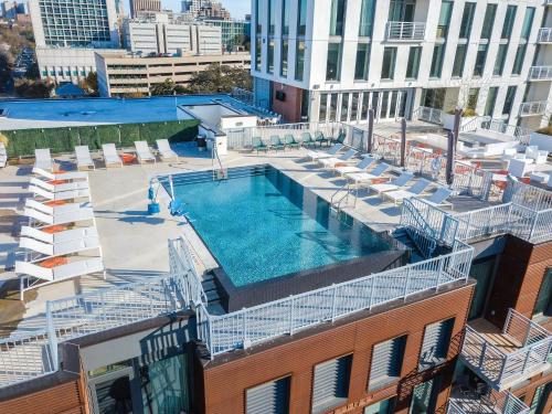 an overhead view of a swimming pool on a building at Austin Resort 2BR Apartment in Austin