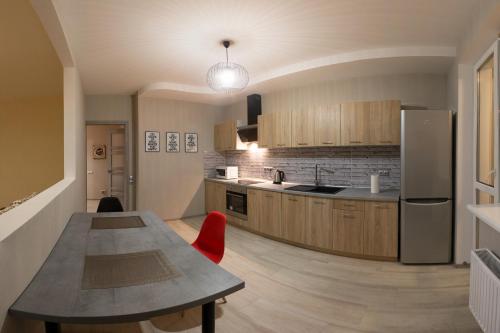Η κουζίνα ή μικρή κουζίνα στο Kyiv Yuriya Ilyenko street new building close to the downtown