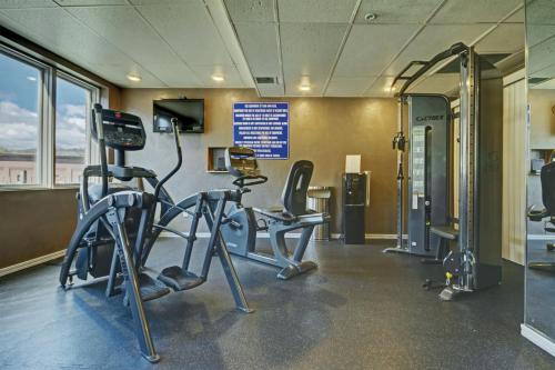 a gym with treadmills and ellipticals in a building at Durango Resort 1BR Apartment in Durango