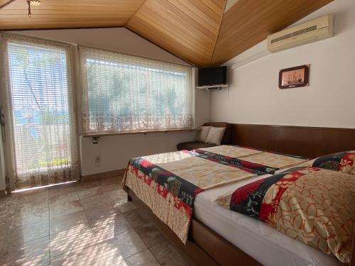 Krevet ili kreveti u jedinici u okviru objekta Bed and Breakfast RiB