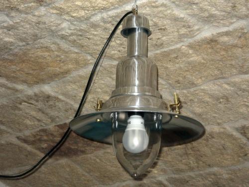 a metal chandelier hanging from a ceiling at B&B La Porta Vecchia in Monopoli