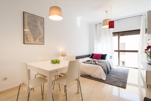 Postel nebo postele na pokoji v ubytování Colón12 Urban Apartment