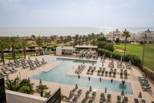 an aerial view of the pool at the resort at The Place Palacio Mojacar & Spa by ALEGRIA Adults Only in Mojácar
