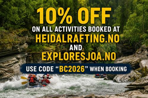 a poster of people rafting on a river at HI Sjoa in Otta