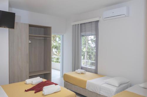 Llit o llits en una habitació de Stefanie Studios