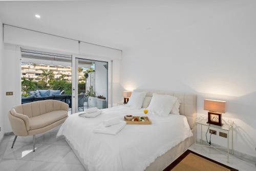 Luxury Beachfront Apt with Private Garden & Pool