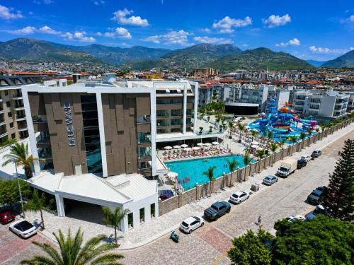 an aerial view of a resort with a pool at Blue Wave Suite Hotel in Alanya