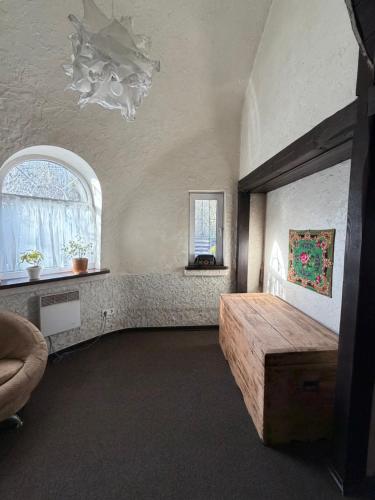 a bedroom with a bed and a window at Kupol for rest in Irpin