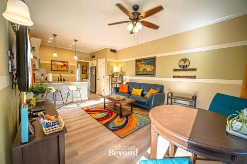 a living room with a couch and a table at Sunset & Lakeview from Castle Turret on The Island in Lago Vista