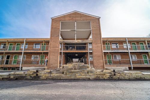 a large brick building with stairs in front of it at Modern Moose Free Shuttle to SDC in Branson
