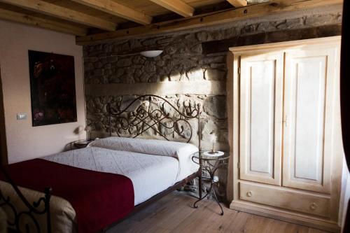 Кровать или кровати в номере Corte della Maddalena