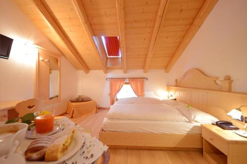 Säng eller sängar i ett rum på Hotel Fonte Dei Veli