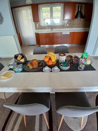 a table with a tray of food on it at Up on the hill in Nafpaktos