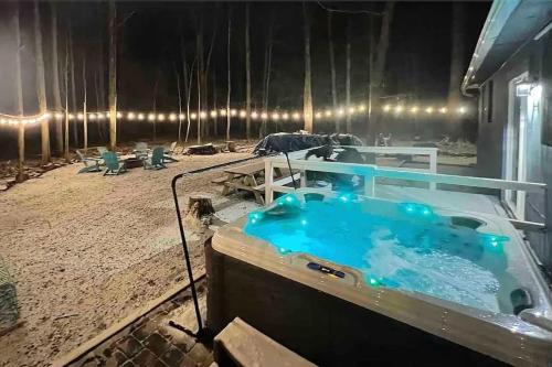 a hot tub on the deck of a boat at Firepit Game Room Seclusion and More in Locust Lakes Village