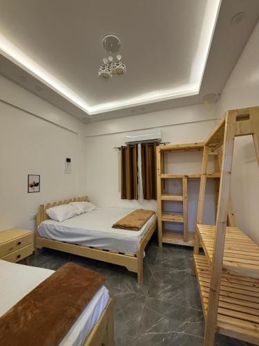 a bedroom with two bunk beds and a ladder at Villa Solla Dahab in Dahab