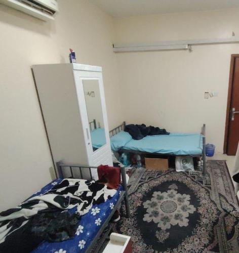 Bed in female or male rooms - opposite the Indian Islamic Center