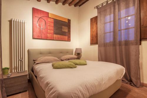 Een bed of bedden in een kamer bij Da Leo